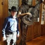Brian Duckworth with Willie Nelson Statue